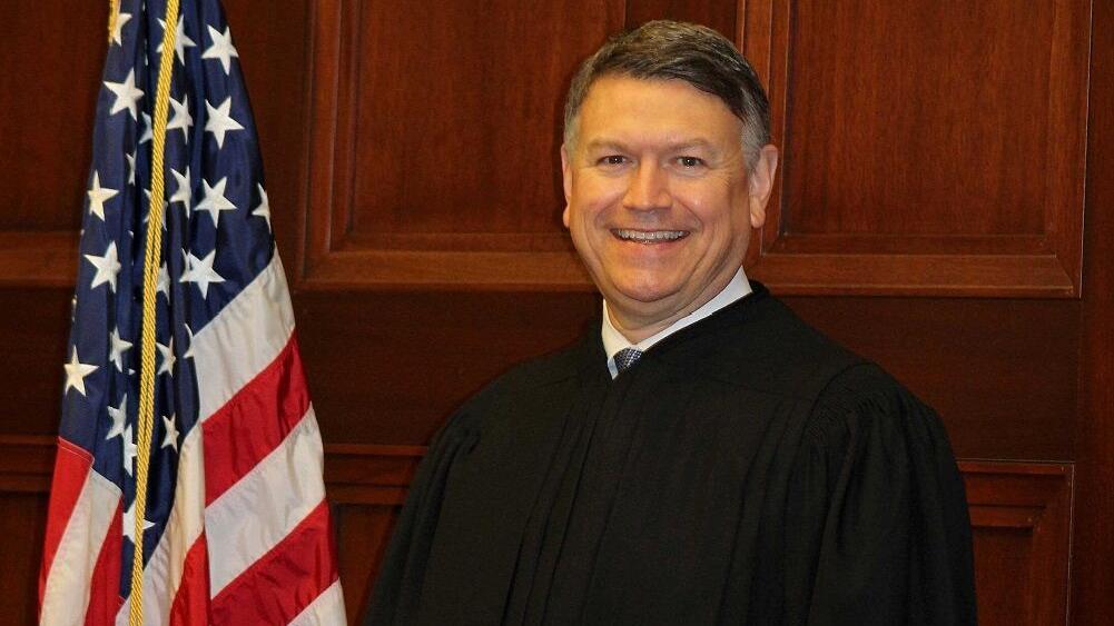 Federal judge puts hold on insurer's arbitration clause